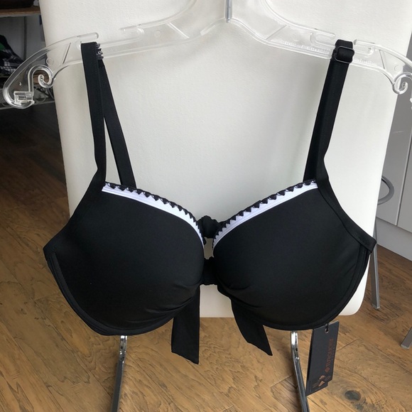 Black bikini top with white trim. - Picture 1 of 4